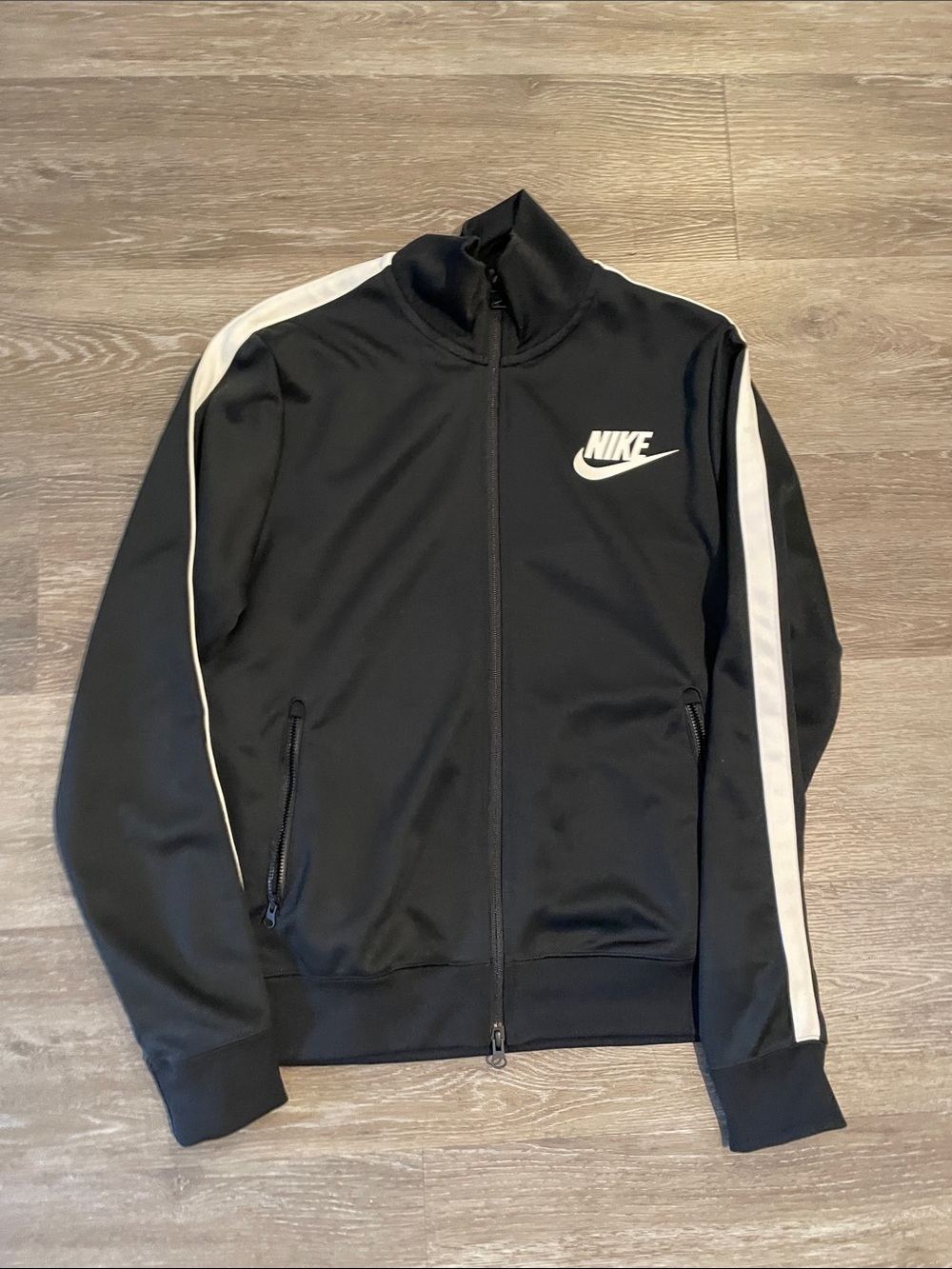 Nike Sportswear Black Track Jacket with White Stripe Accents